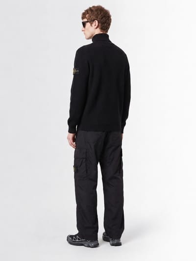 Stone Island: Maglione dolcevita in cotone a coste