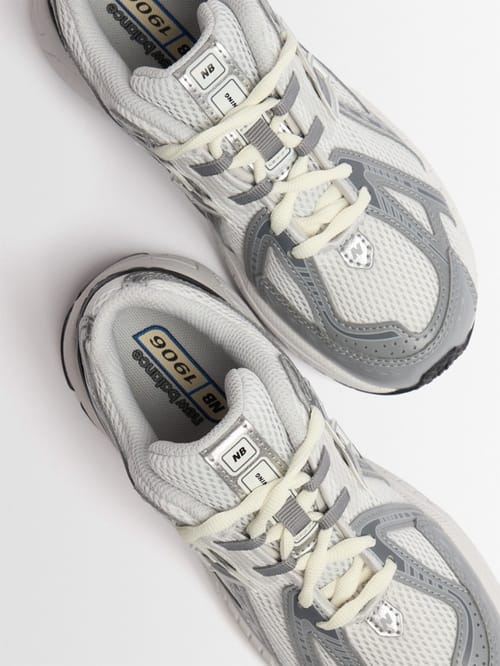 New Balance: Mesh running sneakers with cage