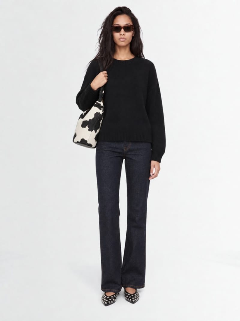 Khaite - Abigail flared cotton denim jeans