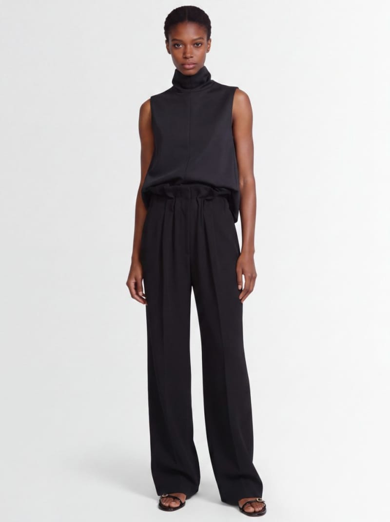 Khaite - Virgin wool pants with draping