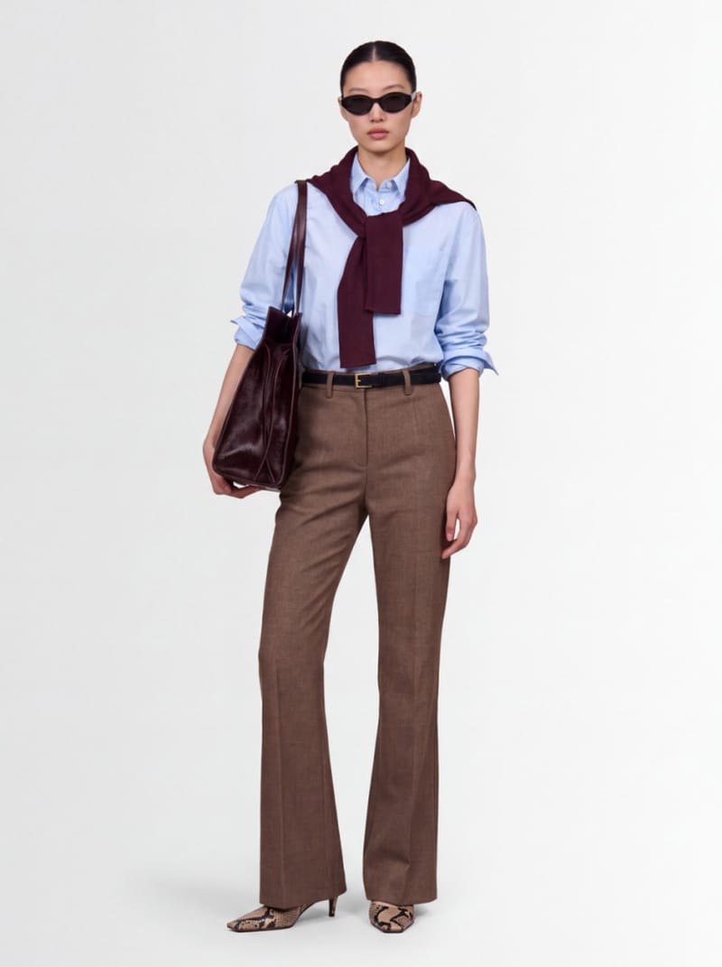 CRUNA - Flared pants with pressed creases
